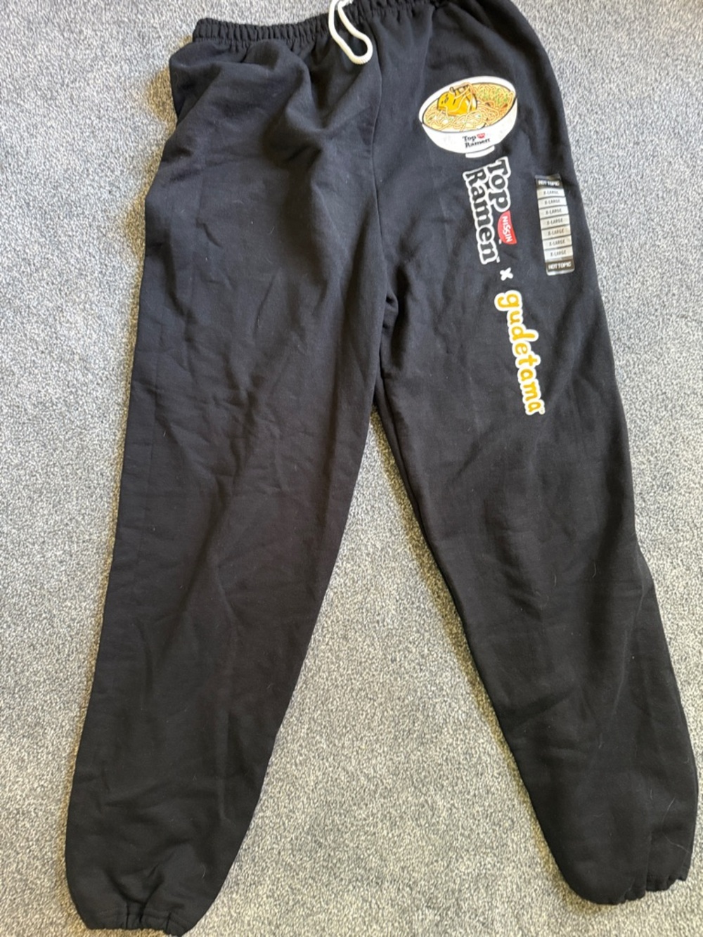Hot Topic Black Sweatpants with Yellow Gudetama Logo